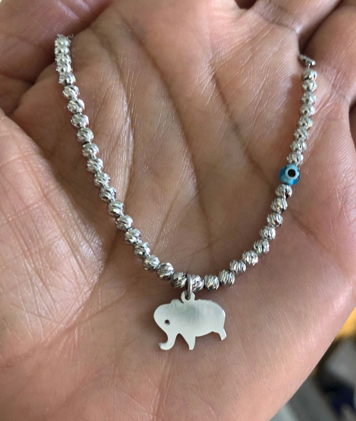 Charm necklace with silver beads evil eye talisman and charms