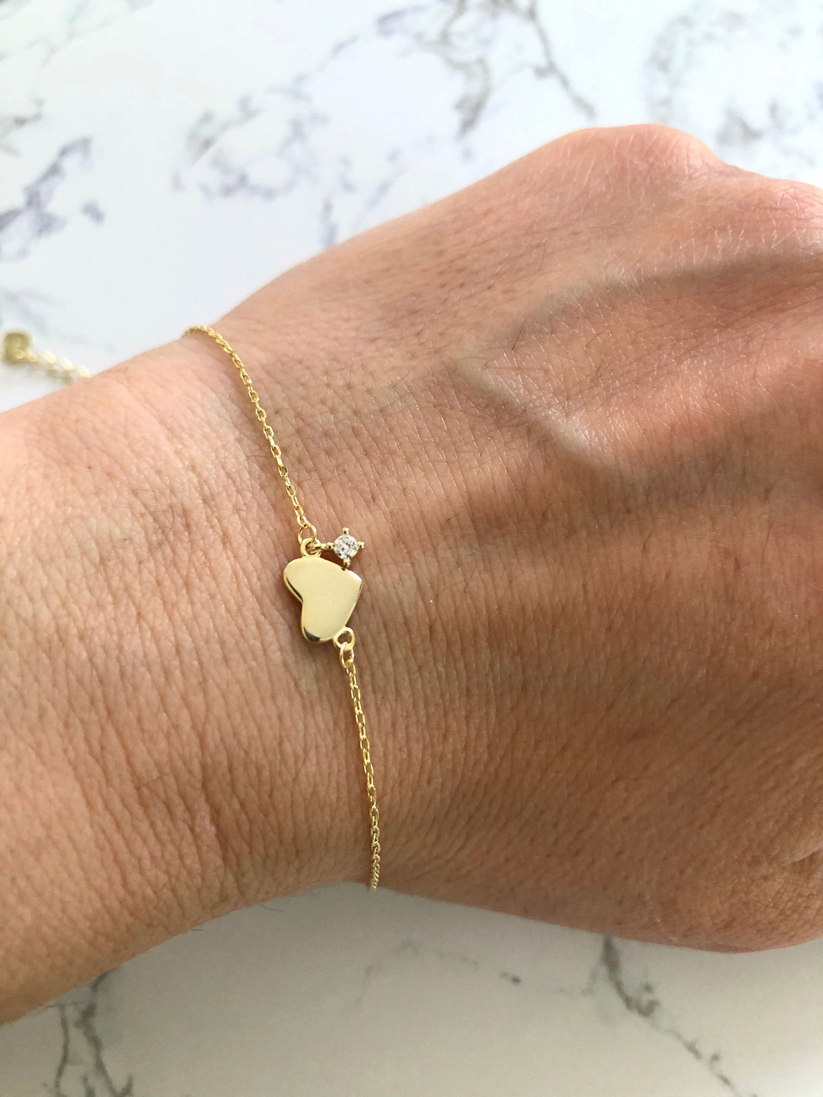 Dainty bracelet with tiny heart