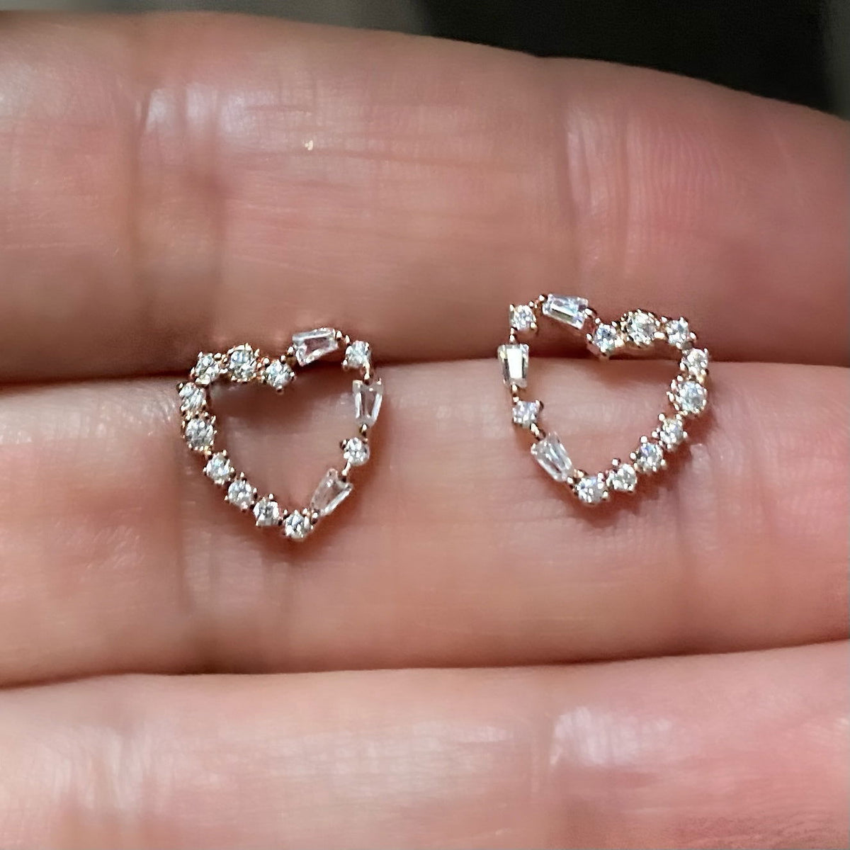 Heart shaped stud with princess cut stones