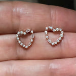 Heart shaped stud with princess cut stones