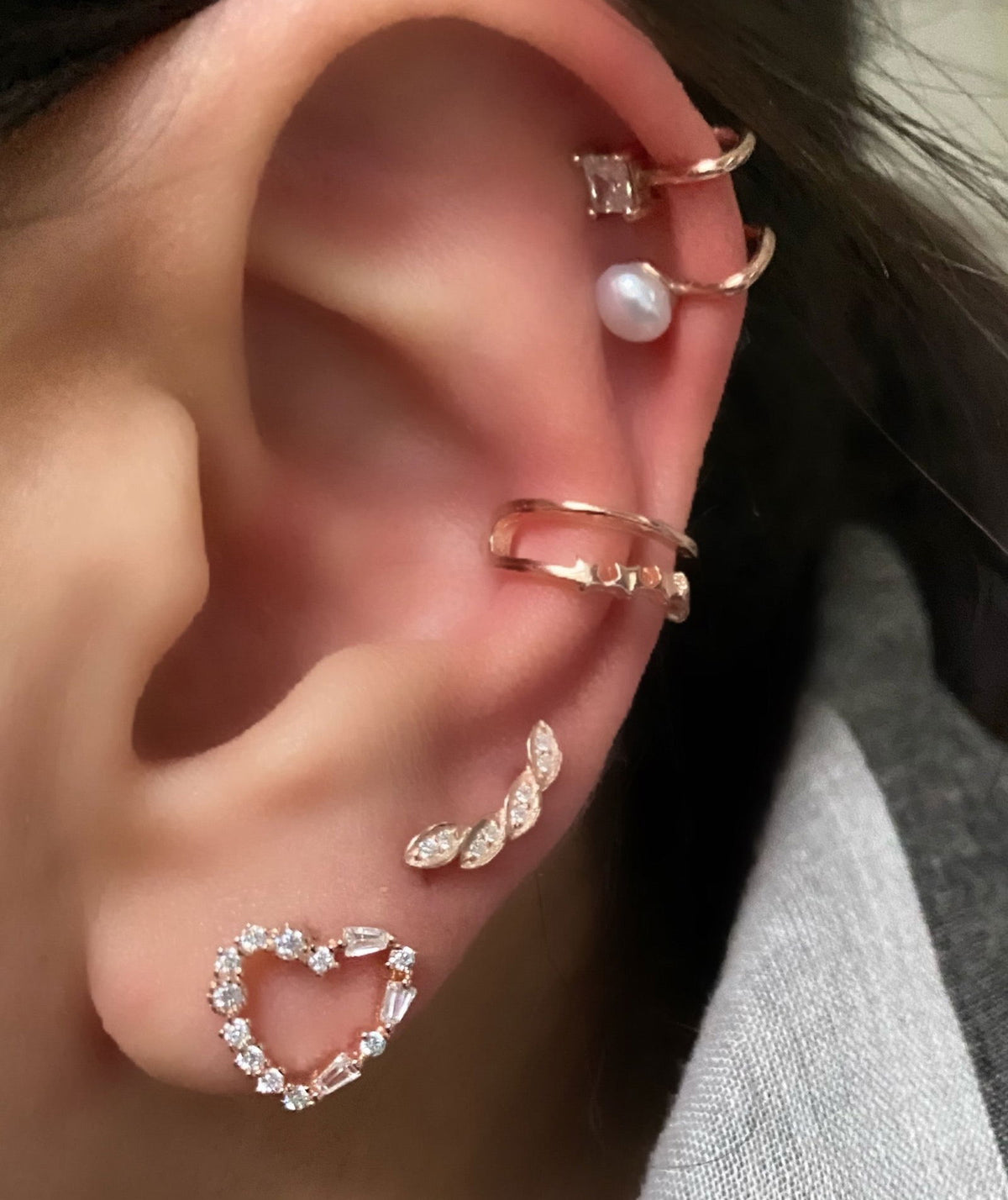 Heart shaped stud with princess cut stones