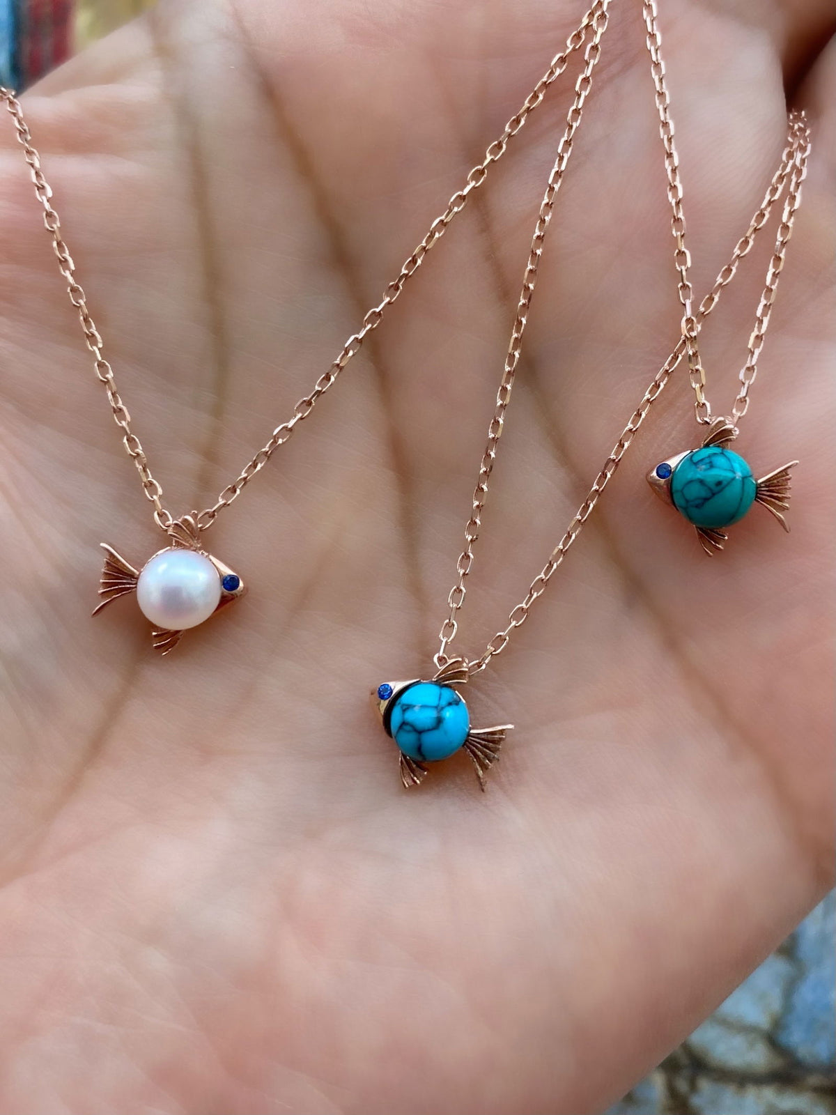 Little Fish with Pearl Necklace