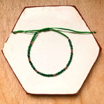 Natural stone friendship bracelets with silver beads dark green