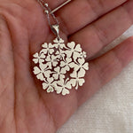 Necklaces with large pendants Clover field Silver