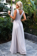 Numoco Bottle Green Brocade Maxi Dress with Deep Neckline and Leg Slit