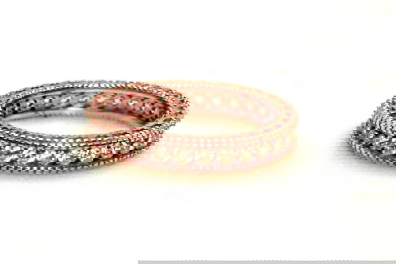 Sandwich ring with pave-set clear zircon stones